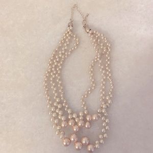 Lia Sophia 3 strand pearl necklace in pink.
